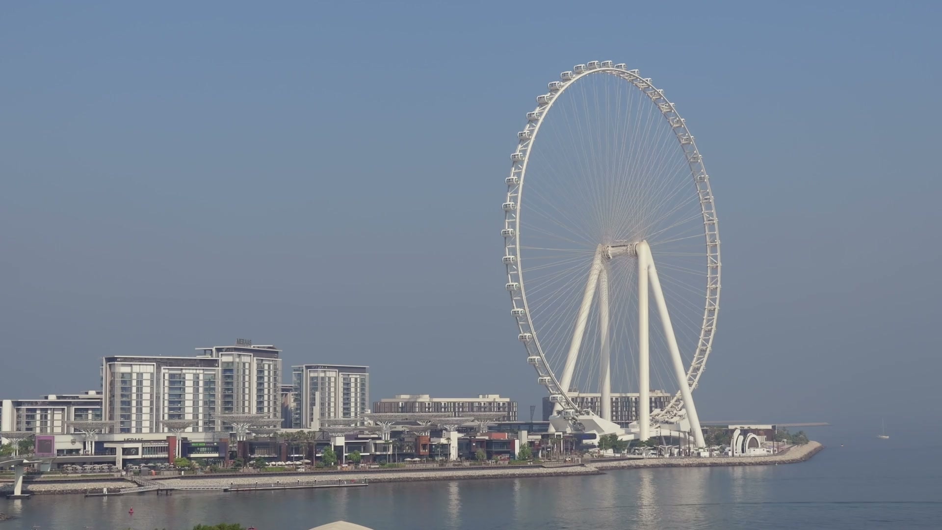Ain Dubai, the observation wheel on Bluewaters Island, seen across the water from the Dubai Marina shoreline