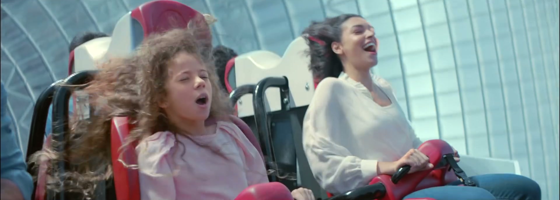 A family riding Formula Rossa beneath Ferrari World Abu Dhabi's glass roof
